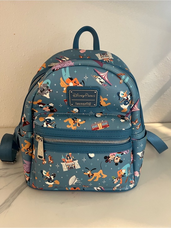 Loungefly Handbags - Disney Parks Loungefly Disneyland Resort Icons Mini Backpack 2020